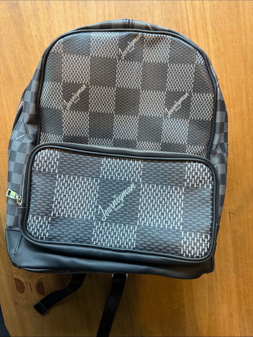 Women's Black Checkered Backpack with Front Zip Pocket